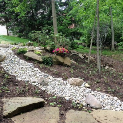 Landscape Design with Sandstone Walkway and Dry Creek Bed