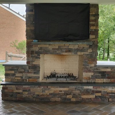 Fireplace with mounted TV